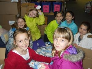 This young girl scout troop helped EBC by sorting socks!